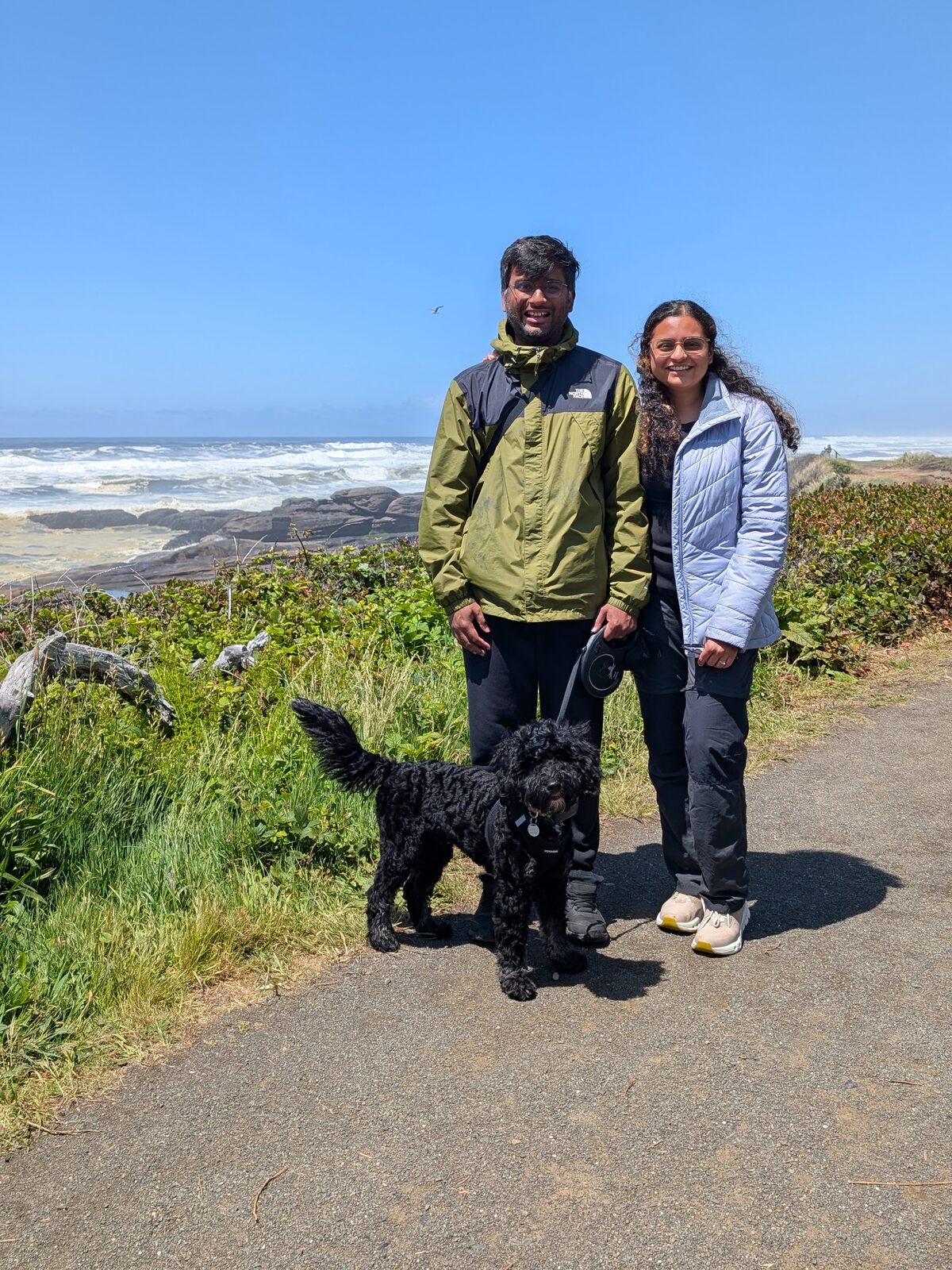 My wife, Oreo and me on a coastal trail